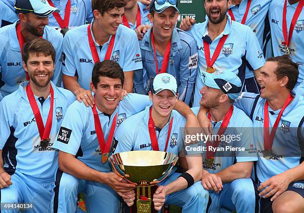 New South Wales celebrate with the trophy after the Matador BBQs One Day Cup final match between New South Wales and South Australia at North Sydney...