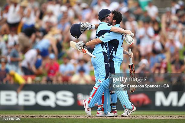 Blues captain Steve Smith and team mate Ed Cowan celebrate winning the Matador BBQs One Day Cup final match between New South Wales and South...