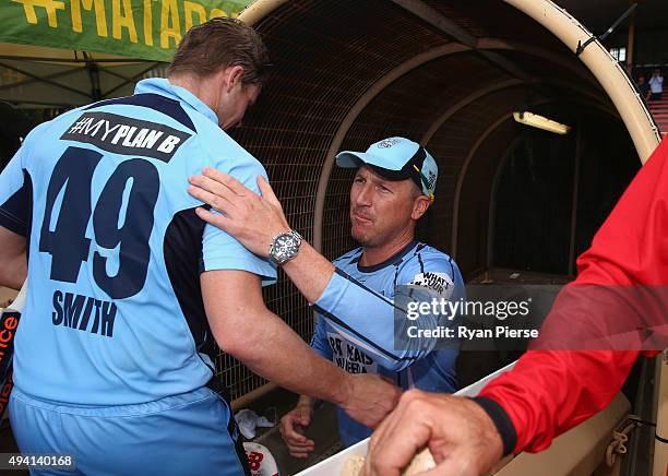 Steve Smith of the Blues is congratulated by Brad Haddin after the Matador BBQs One Day Cup final match between New South Wales and South Australia...