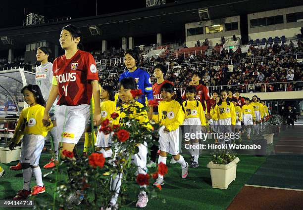 Players enter the pitch prior to the Nadeshiko League match between Urawa Red Diamonds Ladies and JEF United Chiba Ladies at Urawa Komaba Stadium on...