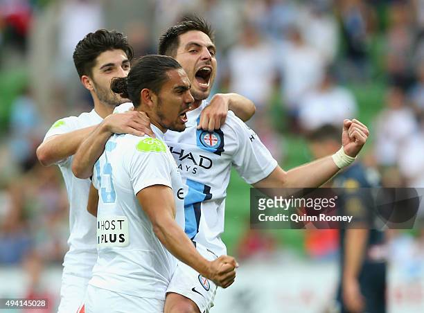Bruno Fornaroli of City is congratulated by Paulo Retre and David Williams after scoring a goal during the round three A-League match between...