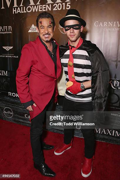 Executive Producer of Karma International Dylan Marer and recording artist Nick Jonas attend the Maxim Halloween Party Presented By Karma...