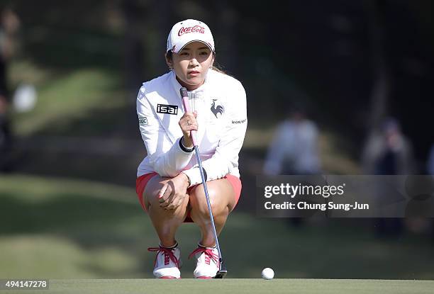 Bo-Mee Lee of South Korea looks over a green on the 1st hole during the final round of the Nobuta Group Masters GC Ladies at the Masters Gold Club on...