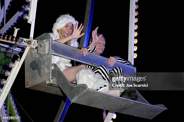 Model Crystal Harris and Hugh Hefner attend the annual Halloween Party, hosted by Playboy and Hugh Hefner, at the Playboy Mansion on October 24, 2015...