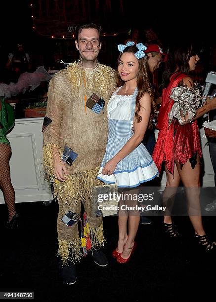Cooper Hefner and actress Scarlett Byrne attend the annual Halloween Party, hosted by Playboy and Hugh Hefner, at the Playboy Mansion on October 24,...