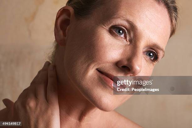 relief from the day's cares - mature woman face beauty stockfoto's en -beelden