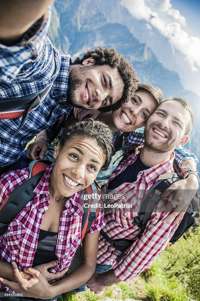 Group of friend taking selfie in mountain