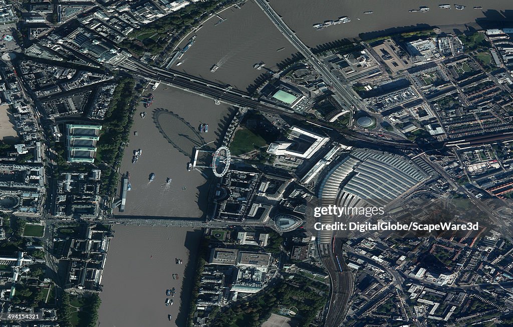 This is a closeup DigitalGlobe satellite image of London England showing the River Thames and the London Eye ferris wheel.