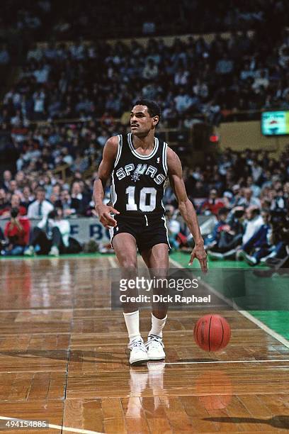 Maurice Cheeks of the San Antonio Spurs drives against the Boston Celtics during a game played circa 1990 at the Boston Garden in Boston,...