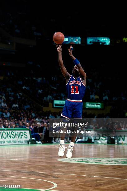 Terrell Brandon of the Cleveland Cavilers shoots the ball against the boston celtics during a game played at the Boston Garden in Boston,...