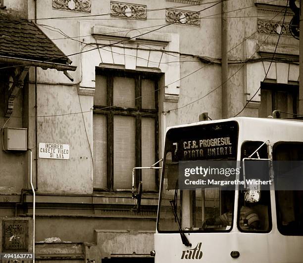 June 02: A tram passes a building on June 2, 2011 in Bucharest, Romania.