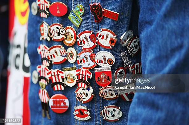 Sunderland fan wearing budges is seen prior to the Barclays Premier League match between Sunderland and Newcastle United at Stadium of Light on...