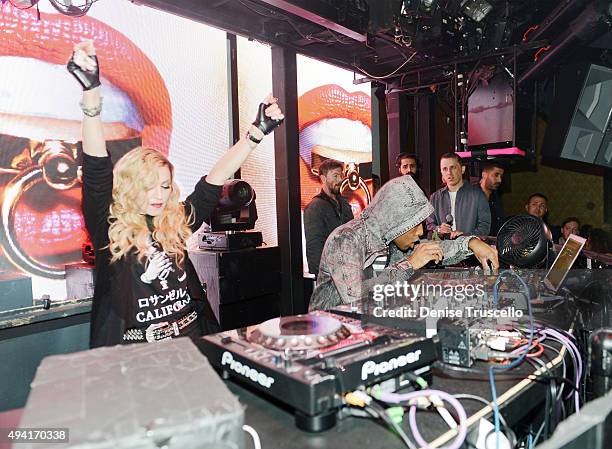 Singer Madonna dances as DJ Lunice performs at Marquee Nightclub at The Cosmopolitan of Las Vegas as she hosts an after party for her Rebel Heart...