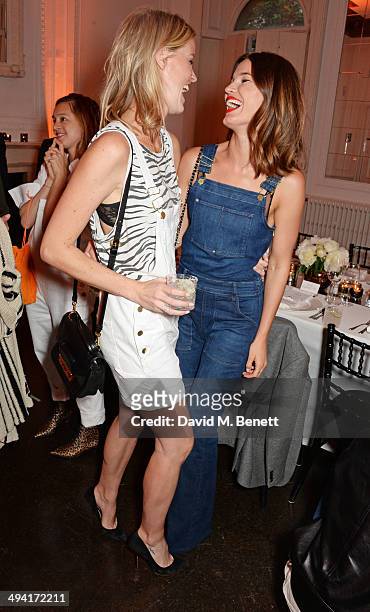 Caroline Winberg and Hanneli Mustaparta attend the FRAME Denim dinner hosted by Hanneli Mustaparta at Il Bottaccio on May 28, 2014 in London, England.
