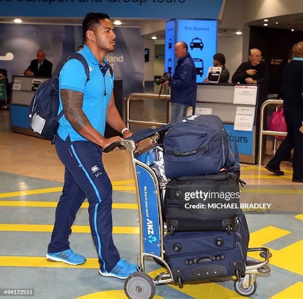 Manusamoa Tuilagi from the English rugby team arrives at the Auckland International Airport in Auckland on May 29, 2014. The England Rugby team are...