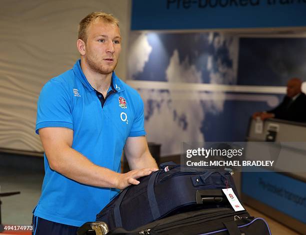Matt Kvesic from the English rugby team arrives at the Auckland International Airport in Auckland on May 29, 2014. The England Rugby team are in New...