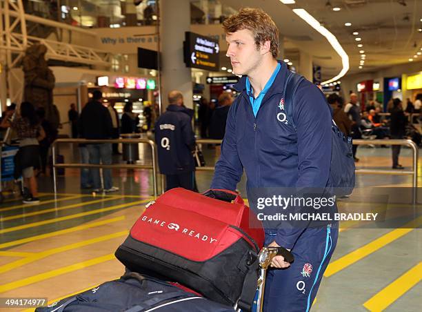 Joe Launchbury from the English rugby team arrives at the Auckland International Airport in Auckland on May 29, 2014. The England Rugby team are in...