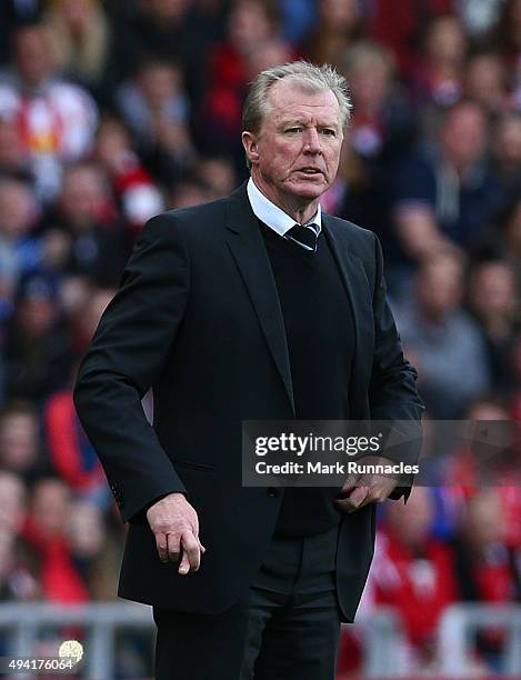 Newcastle United manager Steve McLaren stands on the side line with his fingers crossed as his team are 2 goals down during the Barclays Premier...