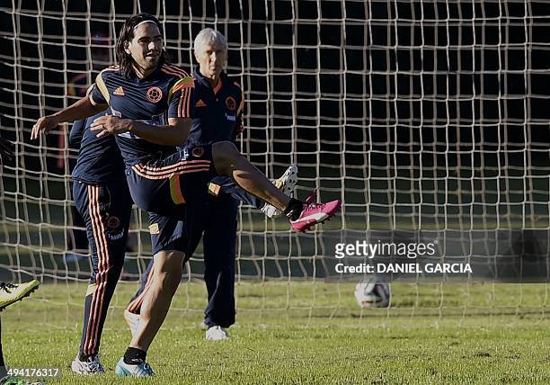 Colombia's national football team striker Radamel Falcao -- who is recovering from surgery on ruptured cruciate ligaments -- takes part in a training...