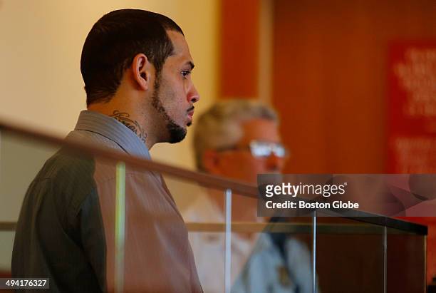 Carlos Ortiz is seen at his arraignment hearing at Fall River Superior Court Tuesday, May 27, 2014 on charges of first degree murder in connection...