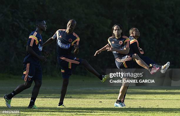 Colombia's national football team striker Radamel Falcao -- who is recovering from surgery on ruptured cruciate ligaments -- takes part in a training...