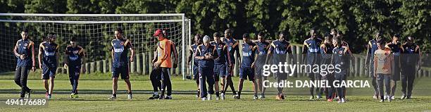 Colombia's national football team head coach Jose Pekerman heads his players during a training session in Loma Verde, Buenos Aires province,...