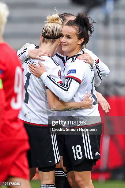 Lina Magull of Germany celebrates her team's fifth goal with her team mates during the UEFA Women's Euro 2017 Qualifier match between Germany and...