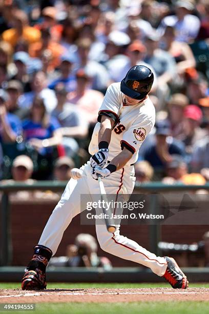 Tyler Colvin of the San Francisco Giants hits an RBI double against the Chicago Cubs during the sixth inning at AT&T Park on May 28, 2014 in San...