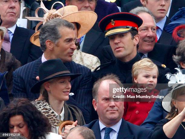 Edward van Cutsem and Nicholas van Cutsem watch Queen Elizabeth II presents new Standards to the Household Cavalry at Horse Guards Parade on May 28,...