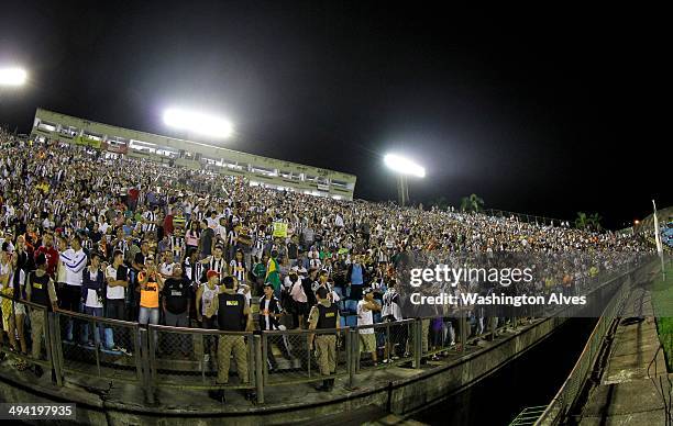 Fans of Atletico MG in action during a match between Atletico MG and Fluminense as part of Brasileirao Series A 2014 at Joao Lamego Stadium on May...