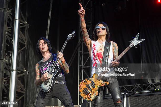 Guitarist Jake Pitts and bassist Ashley Purdy of Black Veil Brides perform at 2015 Monster Energy Aftershock Festival at Gibson Ranch County Park on...