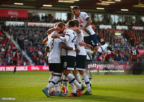 Harry Kane of Tottenham Hotspur celeberates scoring his team's fifth and hat trick goal with his team mates during the Barclays Premier League match...