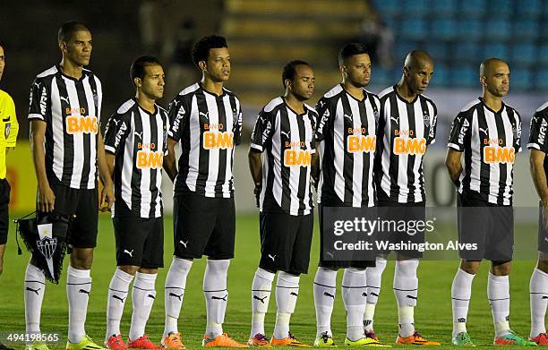 Players of Atletico MG enter the field before a match between Atletico MG and Fluminense as part of Brasileirao Series A 2014 at Joao Lamego Stadium...