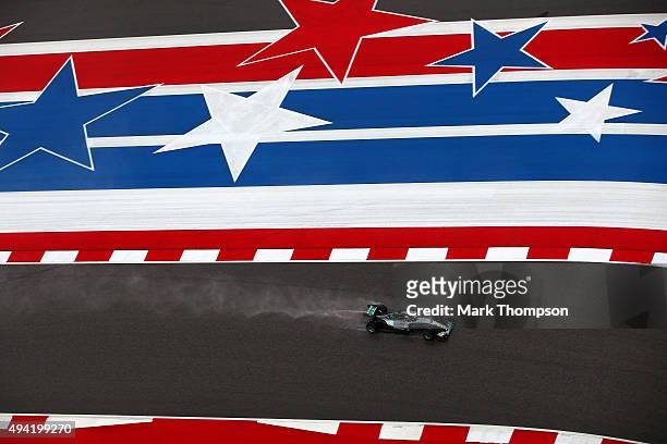 Lewis Hamilton of Great Britain and Mercedes GP drives during qualifying before the United States Formula One Grand Prix at Circuit of The Americas...