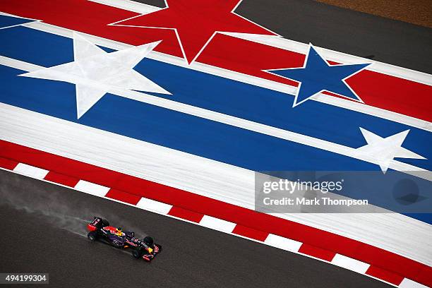 Daniel Ricciardo of Australia and Infiniti Red Bull Racing drives during qualifying before the United States Formula One Grand Prix at Circuit of The...