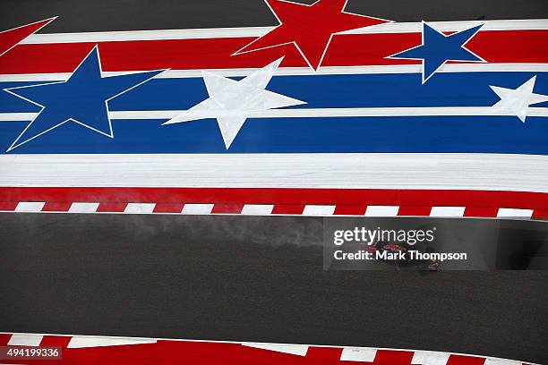 Daniel Ricciardo of Australia and Infiniti Red Bull Racing drives during qualifying before the United States Formula One Grand Prix at Circuit of The...