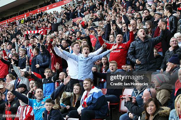 Sunderland fans celebrate during the Barclays Premier League match between Sunderland AFC and Newcastle United at the Stadium of Light on October 25,...