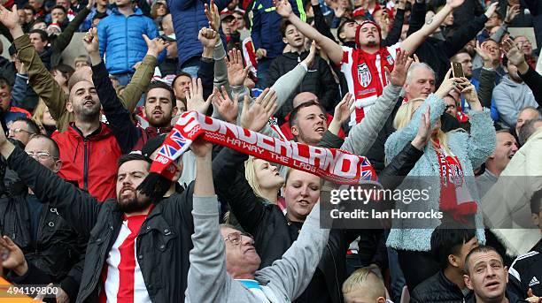 Sunderland fans celebrate during the Barclays Premier League match between Sunderland AFC and Newcastle United at the Stadium of Light on October 25,...