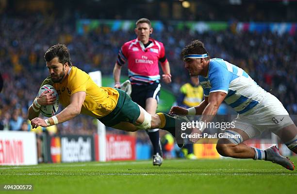 Adam Ashley-Cooper of Australia scores his sides second try during the 2015 Rugby World Cup Semi Final match between Argentina and Australia at...