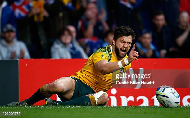 Adam Ashley-Cooper of Australia celebrates after scoring his sides second try during the 2015 Rugby World Cup Semi Final match between Argentina and...