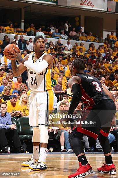 Paul George of the Indiana Pacers handles the ball against the Miami Heat in Game Five of the Eastern Conference Finals during the 2014 NBA Playoffs...