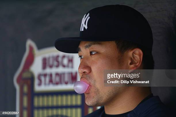Masahiro Tanaka of the New York Yankees looks on from the dugout prior to playing against the St. Louis Cardinals at Busch Stadium on May 28, 2014 in...
