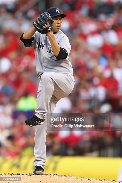Starter Hiroki Kuroda of the New York Yankees pitches against the St. Louis Cardinals in the first inning at Busch Stadium on May 28, 2014 in St....