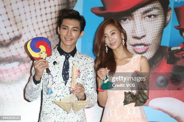 Taiwanese singer Aaron Yan and South Korean singer G.NA attend his new album "DRAMA" launch at W Hotel on May 28, 2014 in Taipei, Taiwan of China.