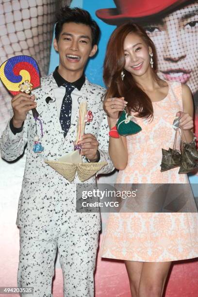 Taiwanese singer Aaron Yan and South Korean singer G.NA attend his new album "DRAMA" launch at W Hotel on May 28, 2014 in Taipei, Taiwan of China.