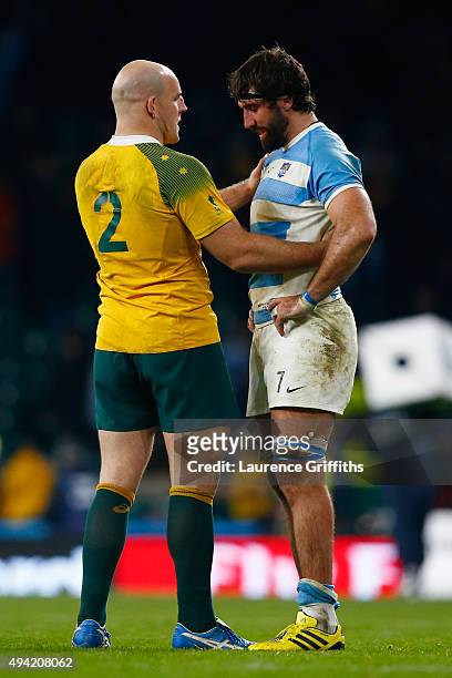 Stephen Moore of Australia consoles Juan Martin Fernandez Lobbe of Argentina at the final whistle during the 2015 Rugby World Cup Semi Final match...