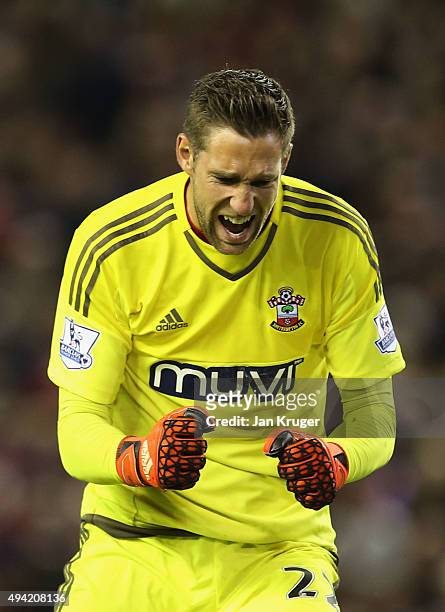 Maarten Stekelenburg of Southampton celebrates his team's first goal during the Barclays Premier League match between Liverpool and Southampton at...