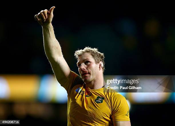 David Pocock of Australia celebrates by giving the thumbs up to the fans after winning the 2015 Rugby World Cup Semi Final match between Argentina...