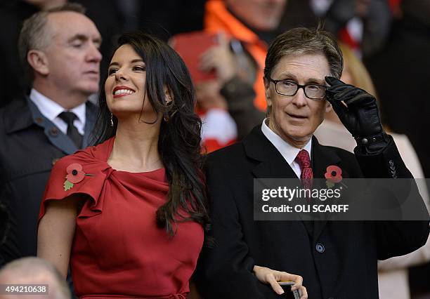 Liverpool's US owner John W. Henry and his wife Linda Pizzuti in the crowd during the English Premier League football match between Liverpool and...