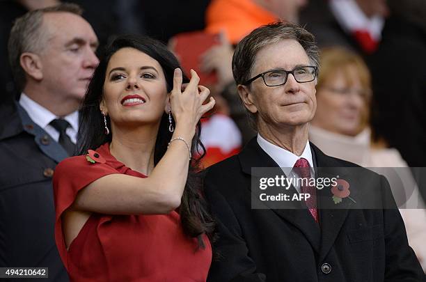 Liverpool's US owner John W. Henry and his wife Linda Pizzuti in the crowd during the English Premier League football match between Liverpool and...